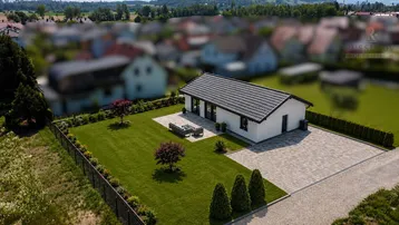 Modernes Einfamilienhaus mit gepflegtem Garten, großer Terrasse und Blick ins Grüne in einer ruhigen Wohngegend.
