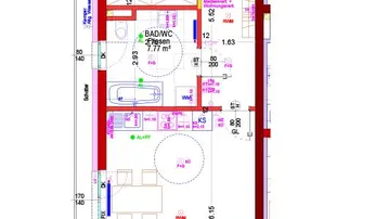 Detaillierter Grundriss einer Wohneinheit mit Wohnküche, Schlafzimmer, Bad und Terrasse.