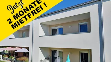 Moderne Wohnanlage mit Balkonen und Terrassen, beworben mit zwei mietfreien Monaten.