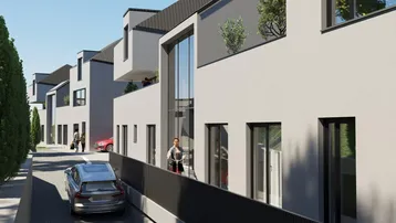 Moderne Reihenhäuser mit großen Glasfronten und Balkonen entlang einer ruhigen Straße.