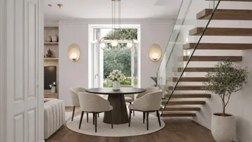 Moderner offener Wohnbereich mit Esstisch, Holztreppe und Blick ins Grüne durch große Fenster.
