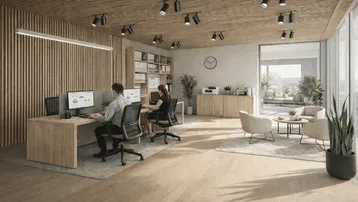 Modernes Großraumbüro mit Holzvertäfelung, Arbeitsplätzen und einem entspannenden Loungebereich mit Blick ins Grüne.
