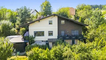 Expose Wohnhaus im Grünen – mit Einliegerwohnung & ausbaubarem Dachboden