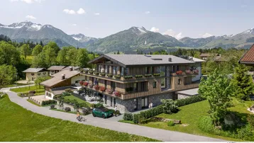 Expose Gemütliche Neubauwohnung mit Bergblick