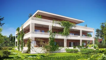 Moderne Wohnanlage mit ansprechender Architektur, großzügigen Balkonen und üppiger Begrünung in sonniger Lage.