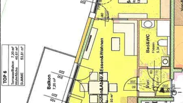 Detaillierter Grundriss der Wohnung TOP 6 mit Balkon und offenem Wohnbereich.