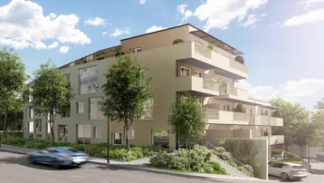 Modernes Mehrfamilienhaus mit Balkonen und großen Fenstern an einer Straße gelegen.