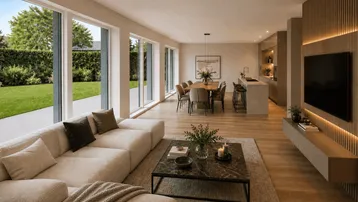 Moderner offener Wohn- und Essbereich mit integrierter Küche und Zugang zum Garten.