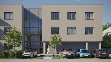 Moderne Wohnanlage mit heller Fassade, großen Fenstern und Parkplätzen vor dem Gebäude.