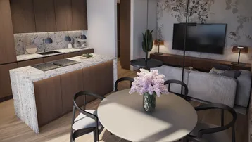 Elegante offene Küche mit dunklen Holzfronten und Essbereich, integriert in den Wohnraum.