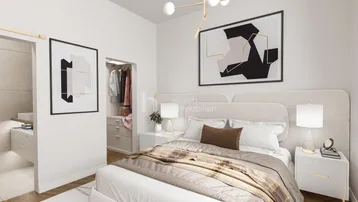 Modernes Schlafzimmer mit hellem Interieur, Parkettboden und direktem Zugang zu einem begehbaren Kleiderschrank.