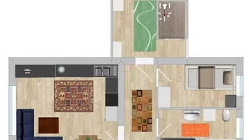 Grundriss einer Wohnung mit offenem Wohn-Essbereich, integrierter Küche, Schlafzimmer und Badezimmer.