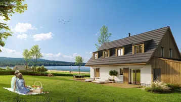 Idyllisches Haus am Seeufer mit großer Rasenfläche und Picknickbereich, umgeben von Natur.