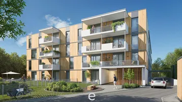 Moderne Wohnanlage mit Holzfassade, Balkonen und begrünten Außenbereichen sowie Parkplätzen.