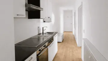 Schmale Küche im Flur mit schwarzen Arbeitsplatten, weißen Schränken und integrierten Geräten.