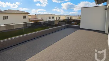 Große Dachterrasse mit modernem Glasgeländer und weitem Blick über die Nachbarschaft.