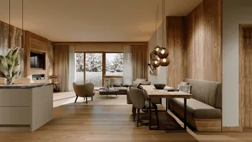 Geräumiger, offener Wohn- und Essbereich mit Holzelementen, Kamin und Blick auf die verschneite Landschaft.
