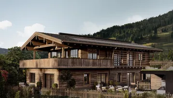 Moderne Holzchalet-Architektur mit großzügiger Terrasse und Bergblick in sonniger Umgebung.