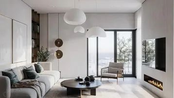 Elegantes Wohnzimmer mit modernem Kamin, großen Fenstern und stilvoller Einrichtung für eine gemütliche Atmosphäre.
