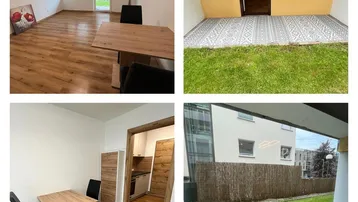 Heller Wohn- und Essbereich mit Holzboden und Zugang zu einer gefliesten Terrasse mit Grünblick.
