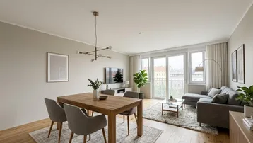 Helles, modern eingerichtetes Wohn-Esszimmer mit Holzboden und Zugang zu einem Balkon.
