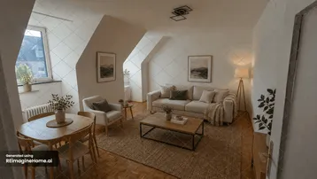 Gemütlicher Wohn- und Essbereich in einer Dachgeschosswohnung mit Holzboden und moderner Einrichtung.