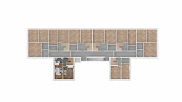 Grundriss einer Etage mit mehreren Wohneinheiten und zentralem Treppenhaus.