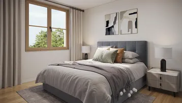 Helles Schlafzimmer mit Holzboden, großem Fenster und modernem Doppelbett.