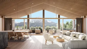 Lichtdurchfluteter Wohn-Essbereich mit hohen Decken, Holzelementen und Panoramablick auf die Berge.