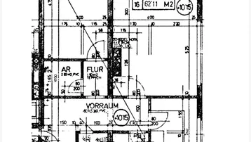 Grundriss einer Wohnung mit Wohnzimmer, Schlafzimmer, Küche, Bad und separatem WC.