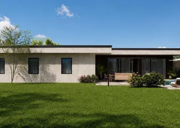 Moderne Hausfassade mit großem Rasenbereich und kleinem Pool im Garten.