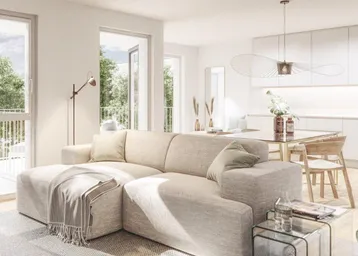 Helles, offenes Wohn-Esszimmer mit moderner Couch, Esstisch und Zugang zum Balkon.