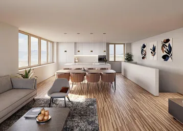 Heller, offener Wohn-Essbereich mit moderner Küche, Holzboden und weitem Ausblick durch große Fenster.