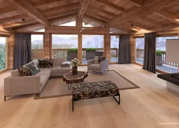 Gemütliches Wohnzimmer im Chalet-Stil mit Holzbalken, großen Fenstern und atemberaubendem Bergblick.