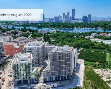 Luftaufnahme eines Neubaukomplexes mit Blick auf die Stadt, den Fluss und grüne Umgebung.