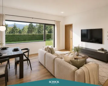 Helles Wohn- und Esszimmer mit modernem Design, Holzboden und weitem Blick ins Grüne.