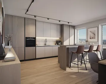 Moderne Küche mit hellen Schränken, Kücheninsel und Essbereich, gut beleuchtet durch Fenster.