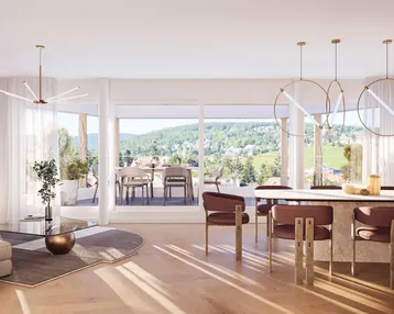 Heller, offener Wohn- und Essbereich mit modernem Design und Zugang zur Terrasse mit Weitblick.