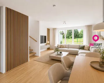 Helles, offenes Wohn- und Esszimmer mit Holzboden, moderner Wandverkleidung und Blick ins Grüne.