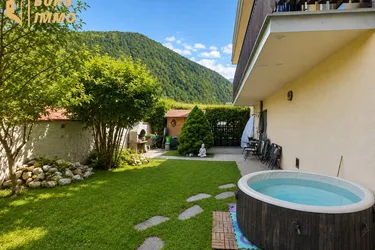 Ein Ort zum Wohlfühlen – 3-Zimmer-Wohnung mit sonnigem Garten, Bergblick und eigenem Parkplatz