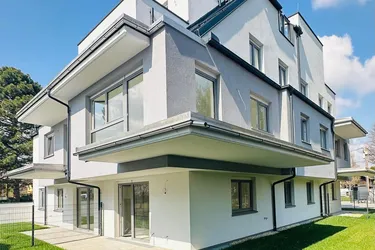 Erdgeschosswohnung mit großzügiger Südterrasse und sonnigem 122 m2 Eigengarten 