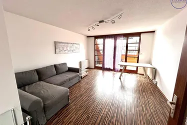 Zentrale Eigentumswohnung mit Loggia und Carport