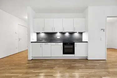 Investment: 2022 fertiggestellte 2-Zimmer Wohnung mit großzügiger Freifläche und Blick ins Grüne!