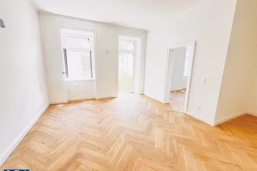 Prachtvoll sanierte Balkonwohnung - ruhige Hofgartenlage