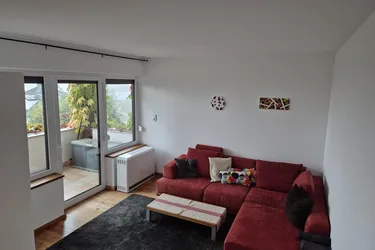 Außergewöhnliche 2,5 Zimmer Wohnung mit Seeblick