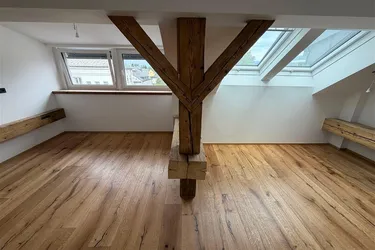 Geschichte im Rücken. Modernes Wohnen voraus.