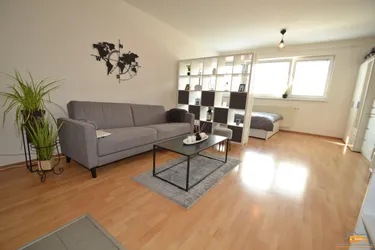 DONAUFELD: Modernes Dachgeschoß-Appartement in zentraler Lage und guter Öffi-Anbindung