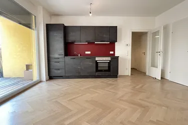 2 Zimmer, Terrasse, Fischgrätenparkett – hochwertige Erdgeschoßwohnung nahe der Mur