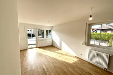 Sonnige 2-Zi.-Gartenwohnung mit Terrasse, Eigengarten und Carport