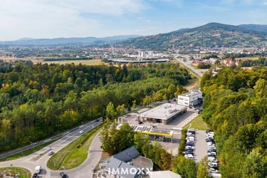 Einmalig an der A2: Gewerbe-Neubau mit Ertrag + 4.600 m² Bauland